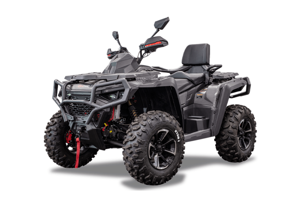 Black and gray ATVquad bike with oversized knobby tires front bumper guard and a rear passenger seat backrest